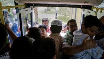 Rude or not rude? Men cram into a city bus in Abu Dhabi. Jaime Puebla / The National