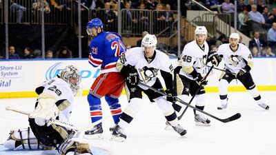 Marc-Andre Fleury, left, is a big reason to the Pittsburgh Penguins' success this season as they march to another play-off spot. Al Bello / AFP