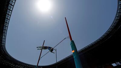 An athlete competes in the women's pole vault final during the morning session of the Tokyo Olympic Games test event at the Olympic Stadium on Sunday, May 9. Reuters