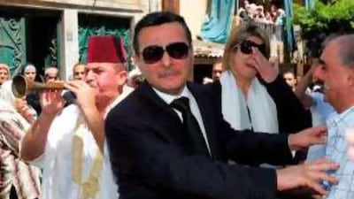 Abdel Sattar Tamim, centre, mourns during his daughter's funeral in Beirut in August 2008.