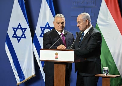 Israel's Prime Minister Benjamin Netanyahu, right, visited Hungarian ally Viktor Orban on Thursday in defiance of an ICC arrest warrant. AFP