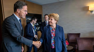 Ms Amherd welcomes Mr Rutte. AFP
