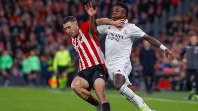 Athletic Bilbao's Oscar de Marcos fights for the ball with Vinicius Junior of Real Madrid. EPA