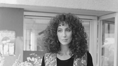 Cher, in a patterned waistcoat, pictured on May 16, 1985. Getty Images