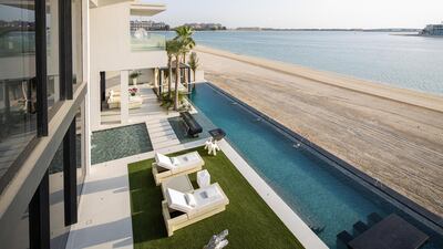 The infinity pool leads down to the private beach. Courtesy Luxhabitat Sotheby's International Realty