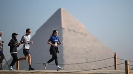 Participants take part in the seventh annual Pyramids Half Marathon at the Pyramids of Giza, Egypt, 13 December 2025. The event brings together runners from around the world to compete under the slogan Race Through History, offering distances of 21 km, 10 km, and 5 km. EPA / Mohamed Hossam