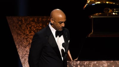 Interim president of The Recording Academy Harvey Mason Jr. holds a moment of silence for late NBA legend Kobe Bryant onstage during the 62nd Annual Grammy Awards pre-telecast show on January 26, 2020, in Los Angeles. AFP
