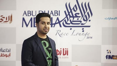 A guest attend the Abu Dhabi Media Racing Lounge and yacht in Yas Marina during the Etihad Airways Formula One Abu Dhabi Grand Prix.