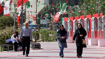 Iranians in Tehran. The return of sanctions could hit the country's economy hard. EPA