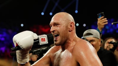 Tyson Fury celebrates winning the fight. REUTERS