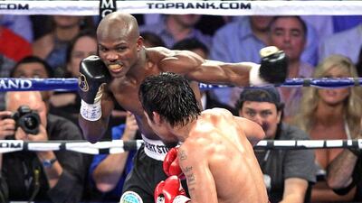 Timothy Bradley, left, unleashes a left against Manny Pacquiao during their WBO welterweight title match at the MGM Grand Arena on June 9, 2012 in Las Vegas, Nevada. Unbeaten Bradley ended Pacquiao's long unbeaten run with a controversial split decision victory over the Filipino ring icon. Ahead of the rematch, Bradley says Pacquiao has 'lost his fire'. John Gurzinski / AFP