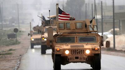 A line of US military vehicles in Syria's northern city of Manbij. AFP