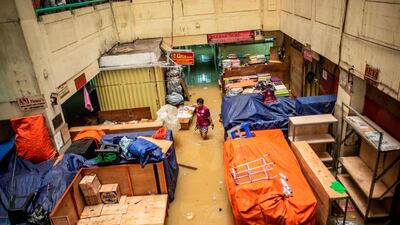 A man walks in an area hit by floods in Jakarta, Indonesia. Reuters