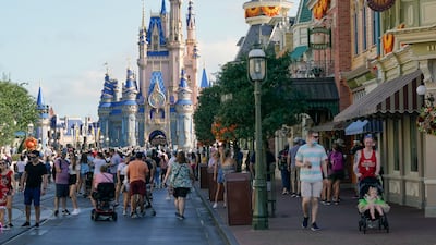 Guests at Walt Disney World in Florida. Disney’s parks division generated $2.45bn in operating income, compared with a loss a year earlier. The company also added more subscribers to its Disney+ streaming service than analysts expected. AP