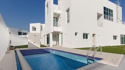 This 7,000-square-foot, five-bedroom, five-bathroom villa is located in the Acacia Avenue community in Jumeirah, Dubai. Courtesy of Lux Habitat
