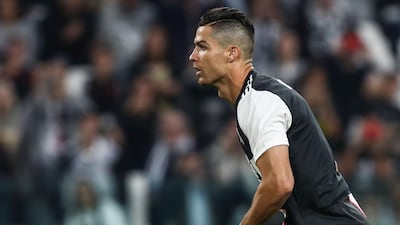 Juventus forward Cristiano Ronaldo watches the ball after shooting a penalty to give Juve a 2-1 lead. AFP