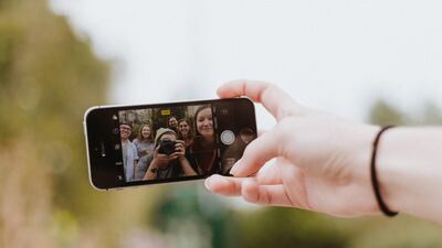 Apple has won a patent to create technology to allow for socially distanced group selfies. Unsplash