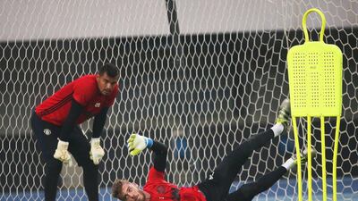 Manchester United goalkeepers Sergio Romero (L) and David de Gea (R) perform during their team’s training session at the Olympic Sports Center in Beijing, China, 24 July 2016. How Hwee Young / EPA