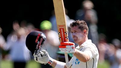 New Zealand's Henry Nicholls celebrates reaching his century in Christchurch. AFP