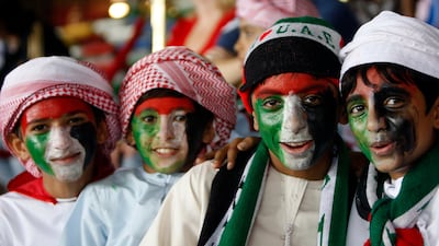 Football fans at Zayed Sports City Stadium in Abu Dhabi for the UAE against Manchester City friendly in 2009, which the UAE won. Stephen Lock / The National