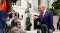 US President Donald Trump talks to reporters at the White House. Reuters