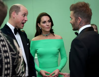 Kate, Princess of Wales, sports a rented dress as she chats with David Beckham and her husband Prince William at The Earthshot Prize awards on Friday. AP