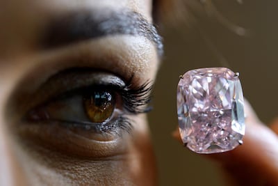 Real diamonds such as 'The Raj Pink', a 37.30-carat pink diamond, are now battling for market share with lab-grown gems. Martial Trezzini / EPA
