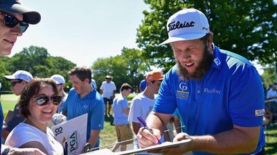 Andrew Johnston of England signs autographs during a practice round prior to the 2016 PGA Championship at Baltusrol Golf Club on July 26, 2016 in Springfield, New Jersey. Stuart Franklin / Getty Images