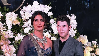 The pair happily posed for pictures as they greeted waiting media / AFP / Sujit Jaiswal