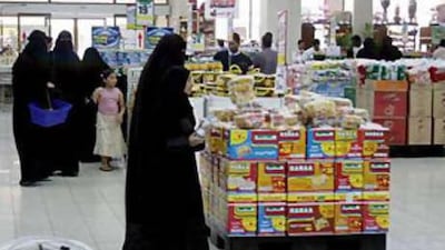 Saudis shopping in a supermarket in Riyadh. Food and beverage costs advanced 15.8 per cent in June.
