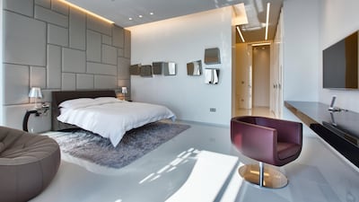 The Miami-themed bedroom. Courtesy LuxuryProperty.com
