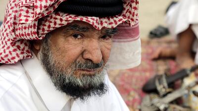 Mr Al Qahtani chats with friends.