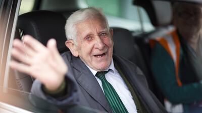 Bernard Jordan waves in Portsmouth, England, as he is driven home on his return from attending D-Day ceremonies in Normandy. Chris Ison / AP Photo / PA / June 7, 2014