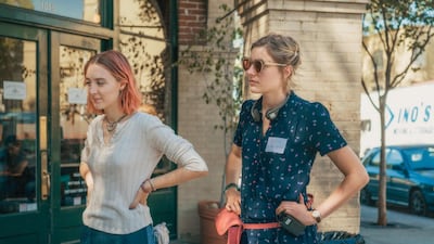 Greta Gerwig, right, and Saoirse Ronan on the set of Lady Bird. Gerwig is the fifth woman nominated for an Oscar for best director. Merie Wallace / A24 via AP