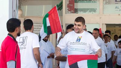 Participants at the Special Olympics Torch Run at Al Thiqah Club for Handicapped. Leslie Pableo for The National
