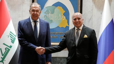 Iraqi Foreign Minister Fuad Hussein, right, with Russian counterpart Sergey Lavrov at the Ministry of Foreign Affairs in Baghdad. AP