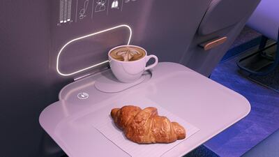 Seat-back trays would become a thing of the past, replaced instead with clip-on meal trays. Courtesy PriestmanGoode