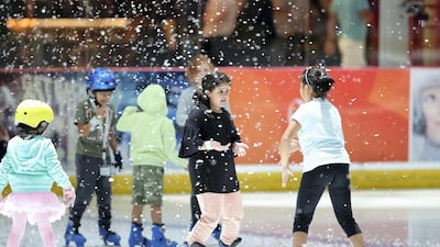 Snowfall sessions take place daily at Dubai Ice Rink, during private lessons and public skating sessions. Chris Whiteoak / The National