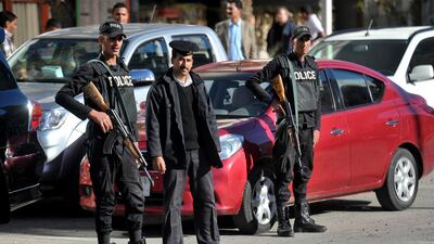 Egyptian security forces stand guard outside the Bella Vista hotel in the Red Sea resort of Hurghada on January 9, 2016, a day after three guests were injured in a knife attack. Mohsen Nabil / AP Photo