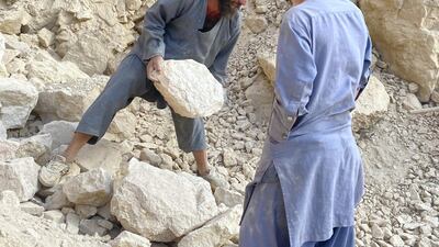 Razmad watches his father, who says he has no option but to teach his trade to his sons.