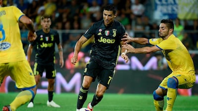 Cristiano Ronaldo takes on Frosinone defender Marco Capuano. AFP
