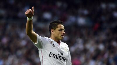 Real Madrid's Javier Hernandez flashes the thumbs up during the team's win against Atletico Madrid in the Champions League quarter-final second leg on Wednesday. Gerard Julien / AFP / April 22, 2015