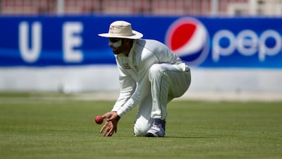 UAE's Ahmed Raza fields the ball against Ireland during the first day of their ICC Intercontinental Cup match at the Sharjah Cricket Stadium in Sharjah on March 12, 2013. Christopher Pike / The National