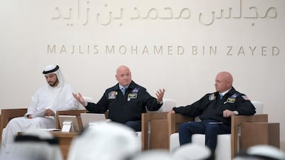 Captain Mark Kelly (R) and Scott Kelly (C), present a lecture titled, ’The Sky is not the Limit: Life Lessons from NASA’s Kelly Brothers’, at Majlis Mohamed bin Zayed. Hamad Al Kaabi / Crown Prince Court - Abu Dhabi.