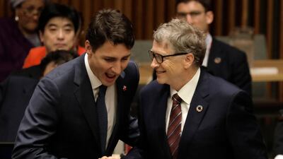Canadian Prime Minister Justin Trudeau, left, shakes hands with Microsoft founder Bill Gates at the High-level Meeting on Financing the 2030 Agenda for Sustainable Development. EPA