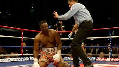 Referee Luis Pabon gives the count to Dereck Chisora during his grudge match with David Haye