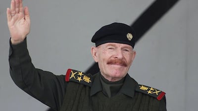 Saddam Hussein's former deputy Izzat Ibrahim Al Douri saluting during a military parade in the northern city of Mosul in February 4, 2003. AFP