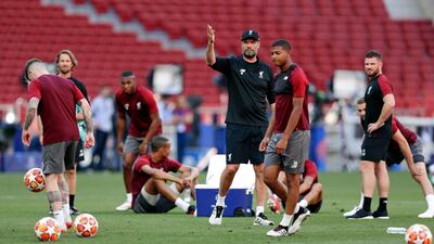 Jurgen Klopp gestures as he oversees training. AP Photo