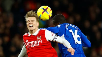Arsenal's Martin Odegaard in action with Everton's Abdoulaye Doucoure. Reuters