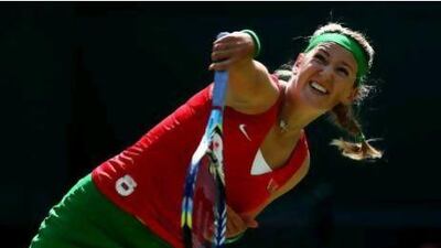 Victoria Azarenka was busy before the start, painting her nails to match the red and green colours of Belarus's flag.